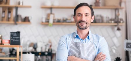 Man with apron in a kitchen